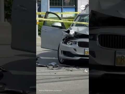 Motorcycle hangs from traffic light after crash