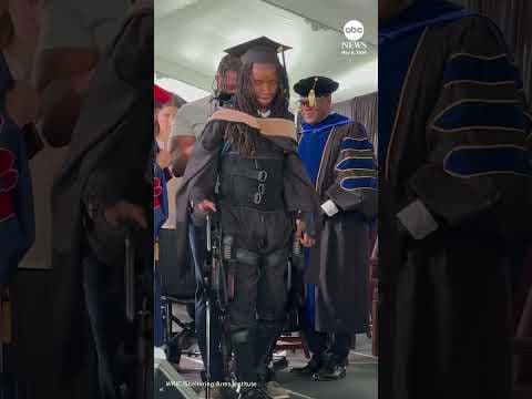 Paralyzed graduate defies odds and walks stage with robotics