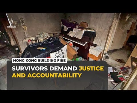 Hong Kong fire survivors revisit burned tower, demand accountability